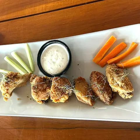 Alitas empanizadas (6 piezas)