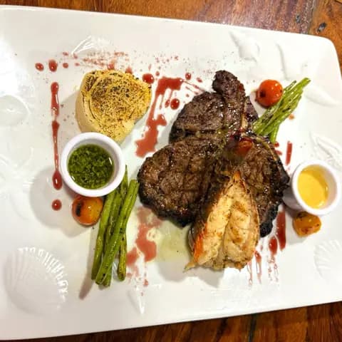 T-bone y langosta