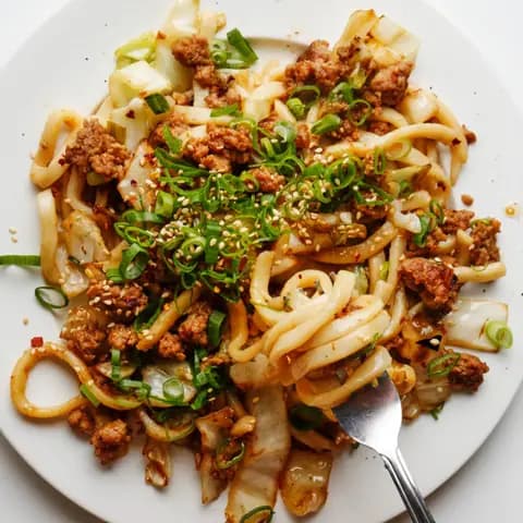 Fideos udon con cerdo